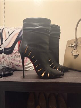 Christian Louboutin Black Stiletto Ankle Boots with cut out accents  -